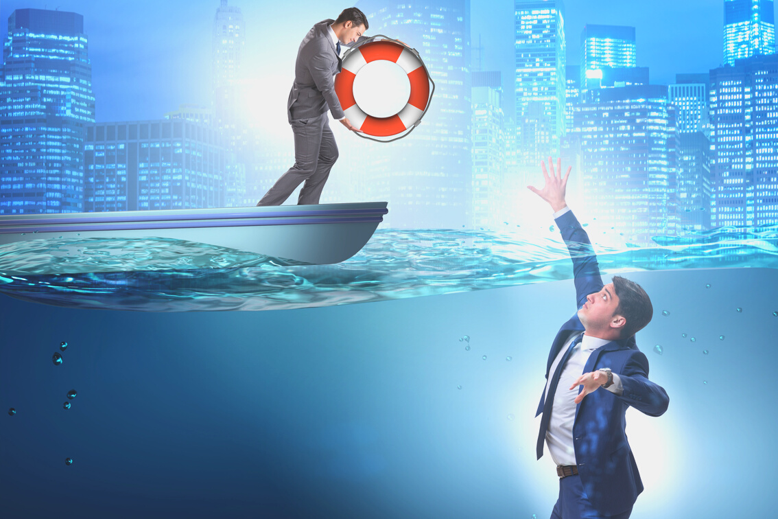 Businessman Being Saved from Drowning