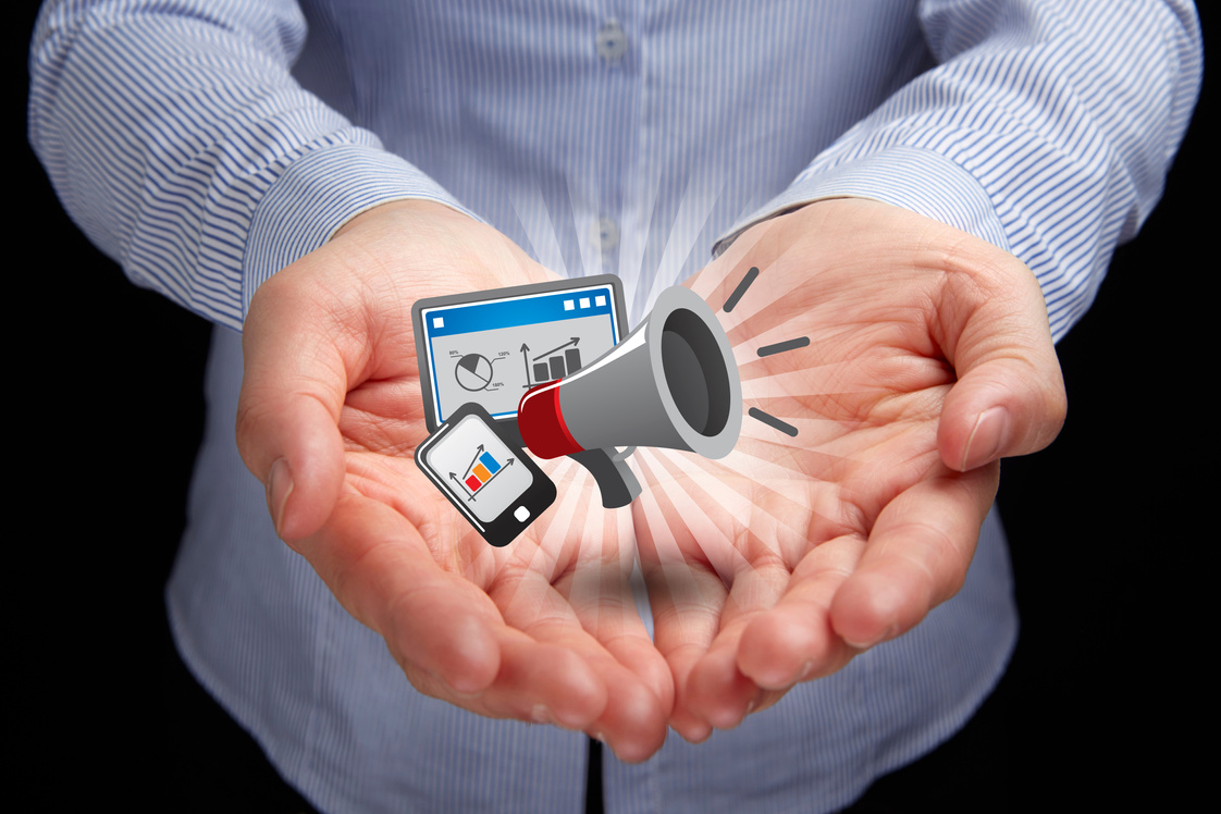 Cupped hands presenting marketing concept